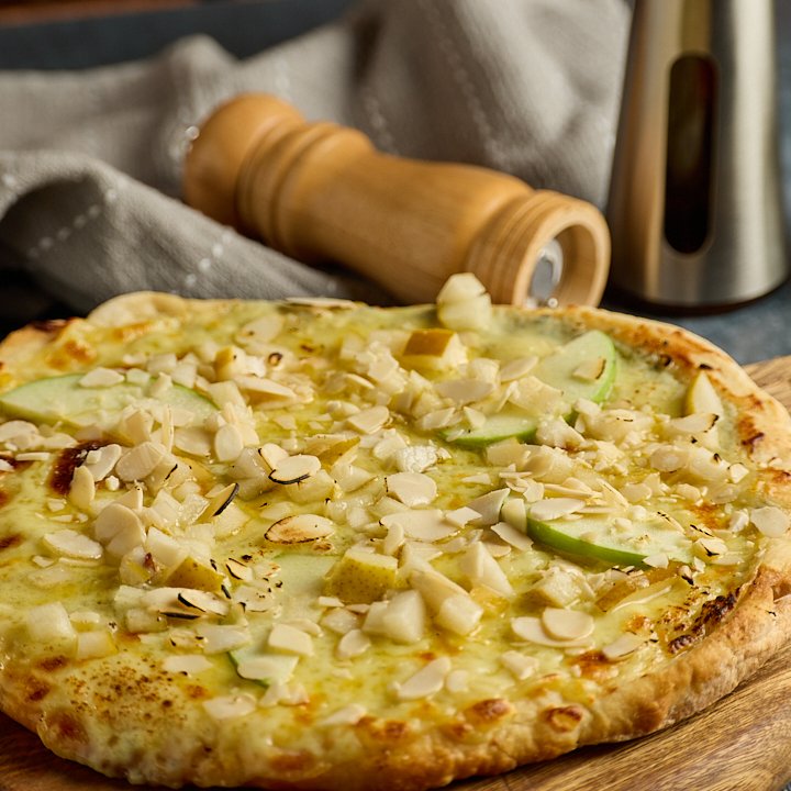 Pizza artesanal fotografiada por Edwin Arias
